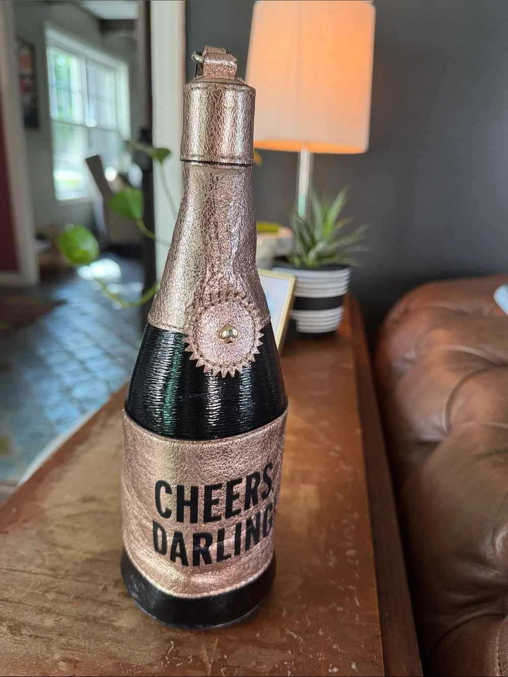 kate spade Rose Gold and Black 'Cheers, Darling' Bottle Clutch